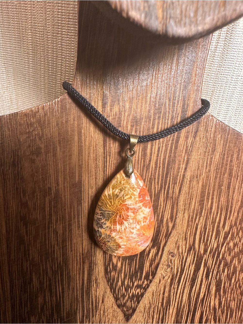 Orange and Black Coral Fossil Teardrop Pendant Necklace on Black Rope - Picture 4 of 16